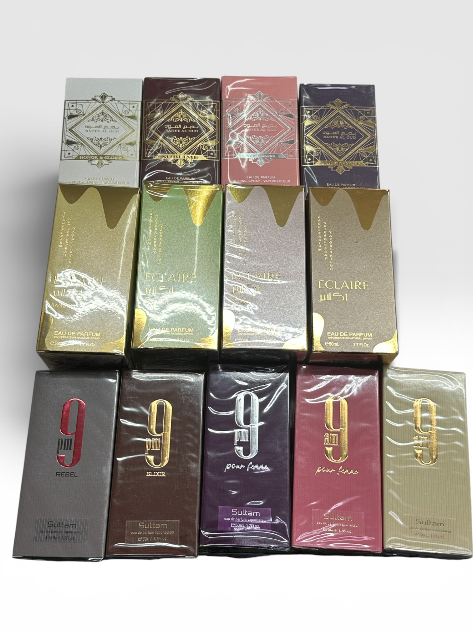 Combo 12 u perfumes de  50 ml de 9 am 9 pm eclair bade al oud